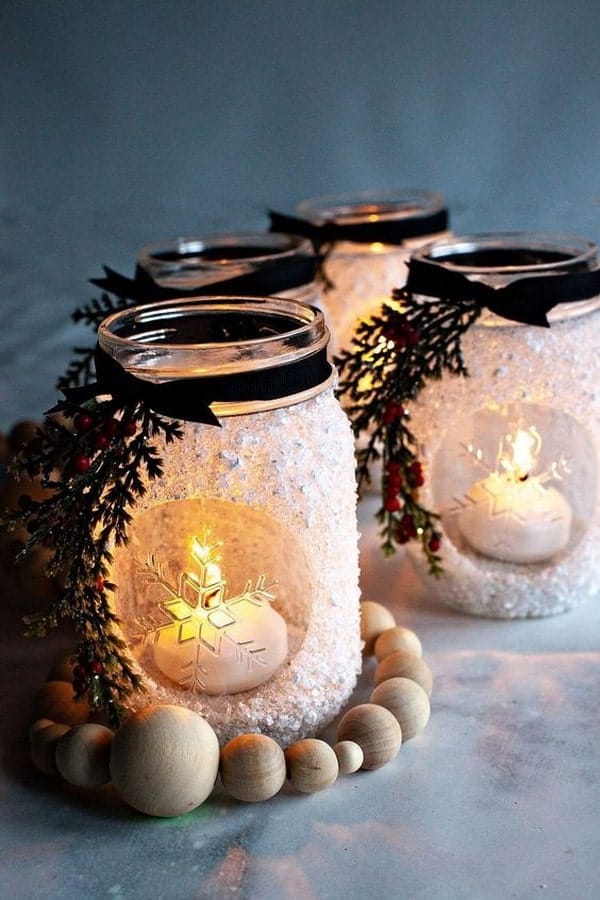 Portavelas con tarros de cristal